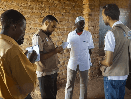Members of the Sabili Foundation listening attentively and taking notes