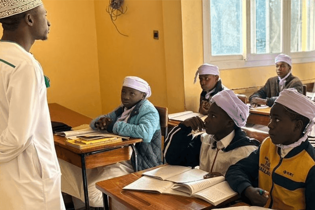 Teacher teaching a class in an African School