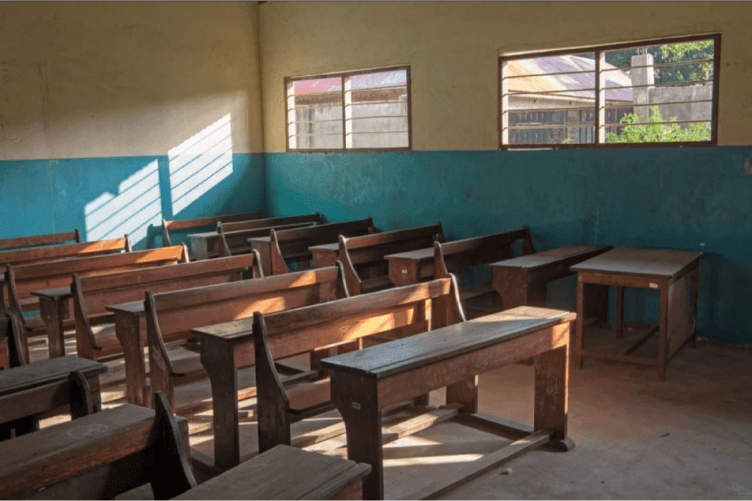 Displaced children in Gaza gather in a schoolyard